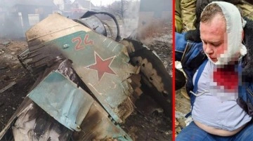 Düşürülen Rus savaş uçağının pilotu, paraşütle indiği evin bahçesinde halk tarafından yakalandı