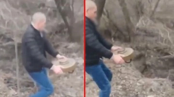 Elinde mayın ağzında sigara! Çılgın Ukraynalı sosyal medyada viral oldu