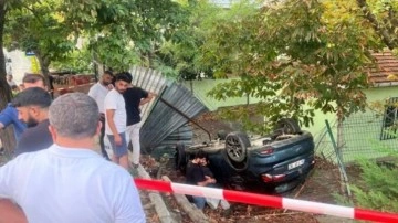 Sancaktepe'de okul bahçesine devrilen otomobildeki iki kişi yaralandı