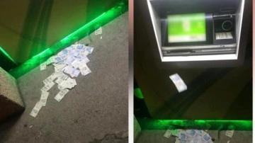 Şaşkın vatandaşın ATM'ye fazla yüklediği paralar yola saçıldı