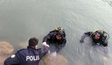 Şüphelilerin baraj gölüne attığı tabanca dalgıç polislere takıldı