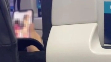 Uçakta cinsel içerikli film izleyen adam, kadın yolcuya yakalandı! Tepkiler art arda geldi